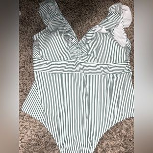 NEW NEVER WORN! Plus swim suite. Fits like a 2x